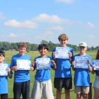 Blue team poses with their awards before flight night